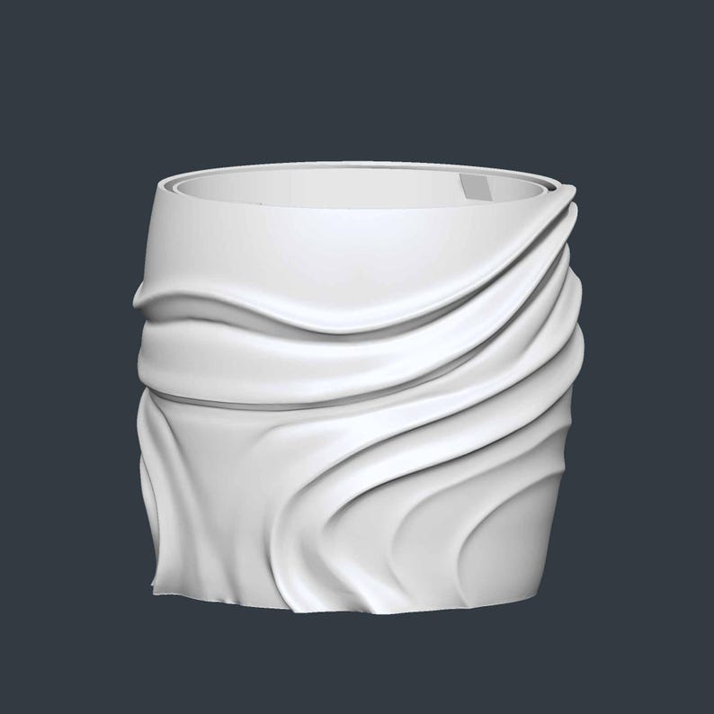 May include: A white, cylindrical planter with a draped fabric design. The planter has a smooth, flowing texture, with the fabric-like material cascading down the sides. The top rim is a simple, clean line. The overall design is modern and minimalist.