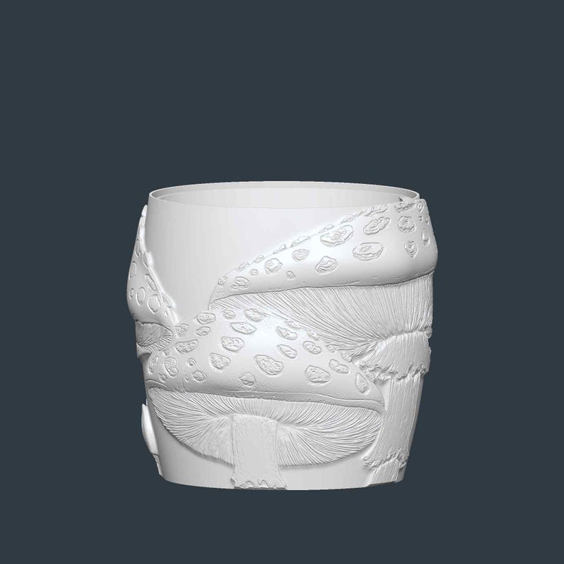 May include: A white, cylindrical ceramic planter with a detailed mushroom design. The planter features a textured surface with embossed mushroom caps and gills, creating a whimsical, nature-inspired aesthetic. The design includes various mushroom shapes and sizes.