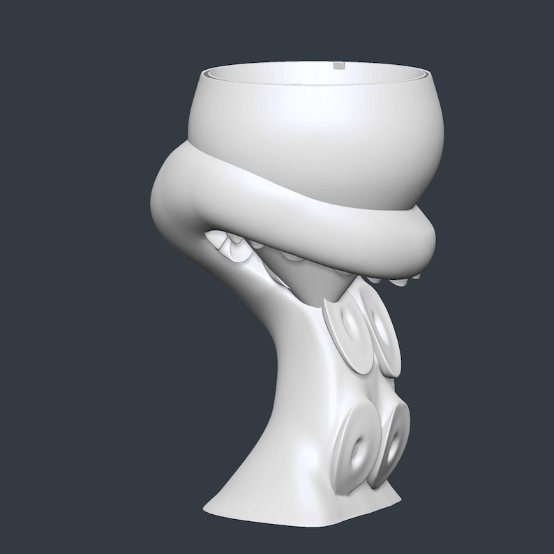 May include: A white, stylized octopus-themed wine glass. The glass features a rounded bowl held by a tentacle-shaped stem with suction cups. The design is a unique, artistic take on a classic wine glass.