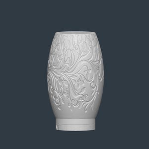 May include: A white, oval-shaped vase with an intricate floral relief pattern. The vase has a wide base and a slightly narrower top. The detailed design features swirling leaves and flowers, creating a textured surface. The background is a solid, dark gray.