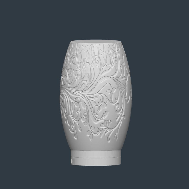 May include: A white, oval-shaped vase with an intricate floral relief pattern. The vase has a wide base and a slightly narrower top. The detailed design features swirling leaves and flowers, creating a textured surface. The background is a solid, dark gray.