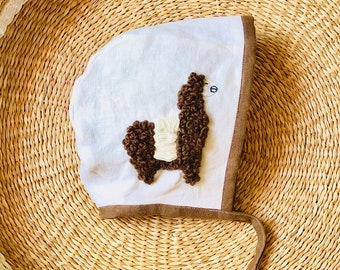 Embroidered linen reversible baby bonnet