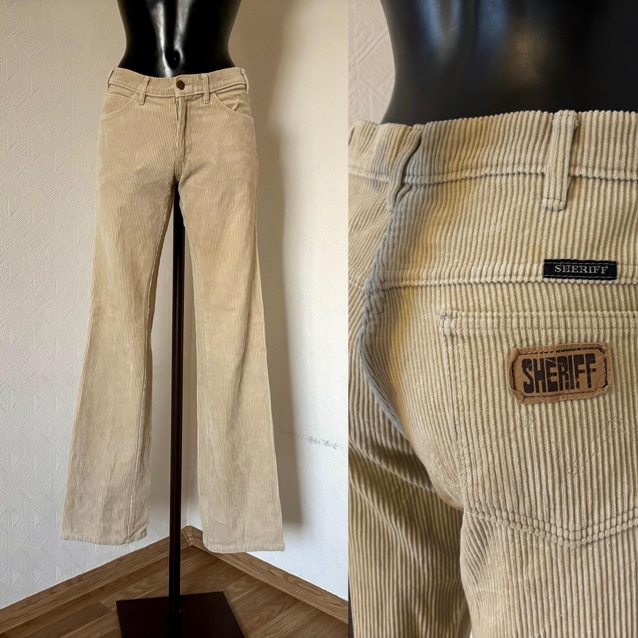 Cream flare pants France