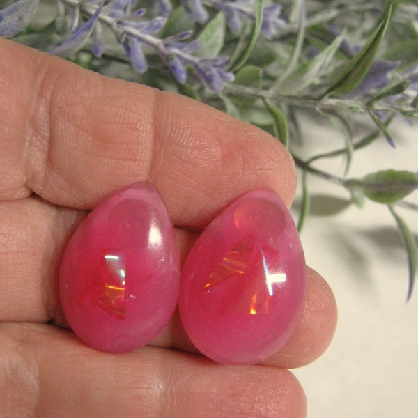 Pink resin and dichro-ish film in pink ear stud earrings. Pink studs for women.  teardrop shape uv resin earrings for women. gold plated