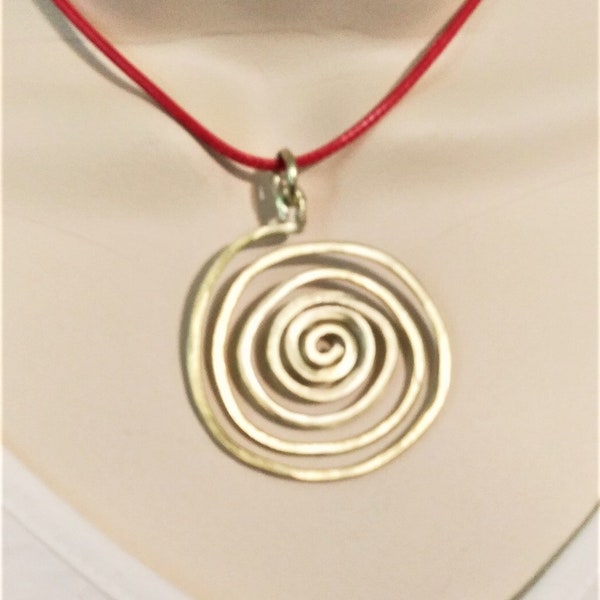 gold aluminum spiral necklace for women. handmade hammered spiral necklace. red or black cording.  contemporary jewelry. women's jewelry