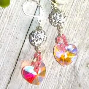 pink glass heart earrings. prism AB heart and silver sparkle ball. party earrings. silver plated lever backs. pink iridescent hearts. glass