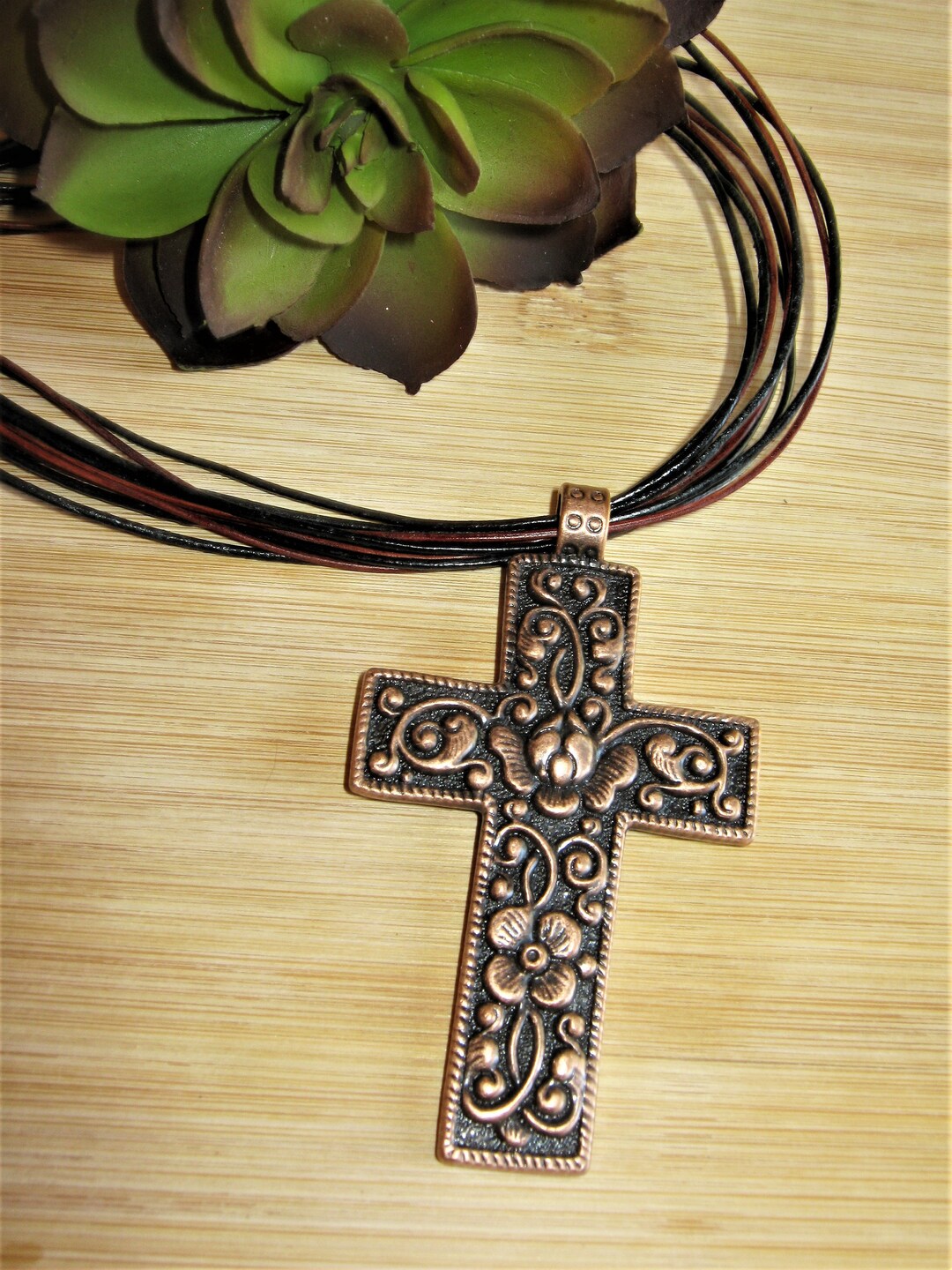 Short Copper Embossed Cross Necklace for Women. Leather Cord Cross