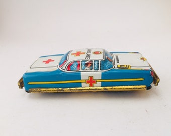 Vintage Nomura Japón estaño coche de juguete ambulancia EE.UU.