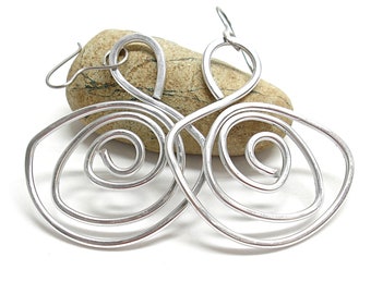 Big aluminum dangle earrings. Modern aluminium spiral earrings. Contemporary statement jewelry.