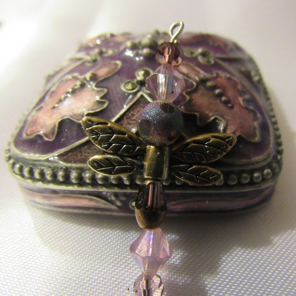 Dragonfly pendant.  Made with  beads and crystals.