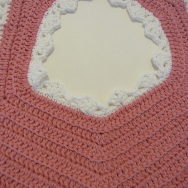 Crocheted rose cotton baby bib.