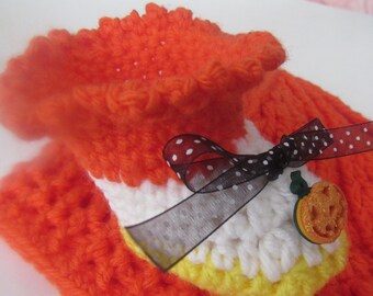 Candy corn baby booties, black ribbon, pumpkin on toe, matching pumpkin hat available.