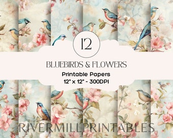 May include: A collection of 12 printable papers featuring bluebirds and flowers. The designs showcase watercolor illustrations of bluebirds perched on flowering branches with pink blossoms. Each paper measures 12 x 12 inches.