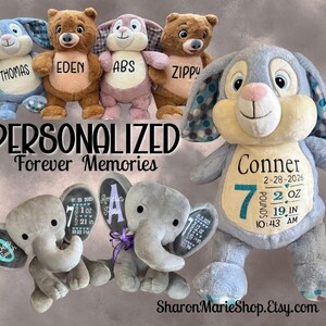 May include: A collection of personalized plush toys, including bears, bunnies, and elephants. The toys are in various colors, with embroidered names and birth details. The text "PERSONALIZED Forever Memories" is displayed.