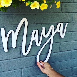 "Personalisiertes, schwimmendes Namensschild: ""PVC Kinderzimmer Dekor""."