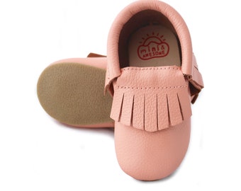 hard sole moccasin boots