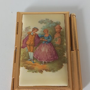 vintage Franse goudkleurige metalen compacte zakspiegel en telefoonboek