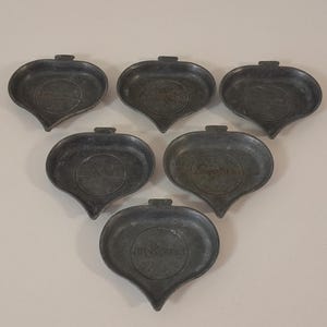 P## set of 6 vintage French small metal Dubonnet shaped table ashtrays