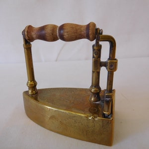 Collectable vintage French small solid brass Hand iron / ornament