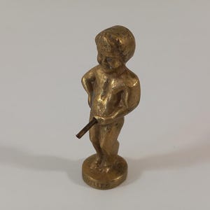 vintage kleine dekorative Figur / Ornament aus massivem Messing