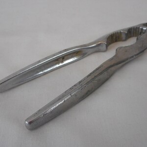 vintage French metal nut cracker / kitchenware / tableware