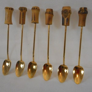 set of 6 vintage boxed Gold Coloured metal spoons / tea spoons