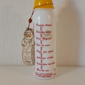 Decanter in vetro bianco per Armagnac francese d'epoca, disegnato come un biberon