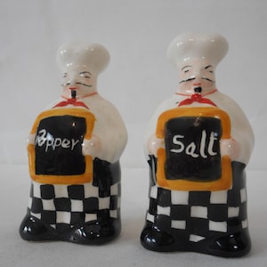 p## Pair of vintage French porcelain decorative salt and pepper pots