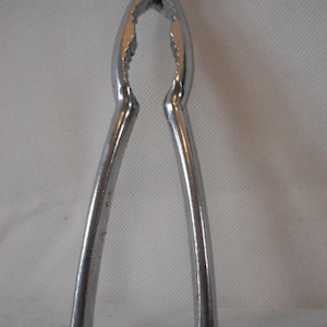 vintage French metal nut cracker / kitchenware / tableware