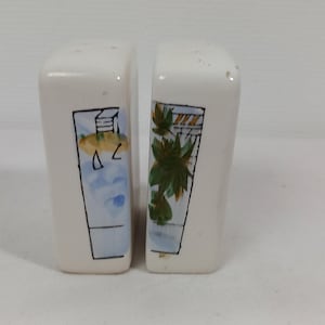 Pair of vintage ceramic salt and pepper pots