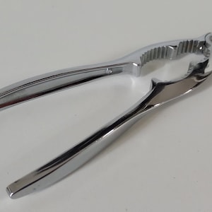 vintage French metal nut cracker / kitchenware / tableware
