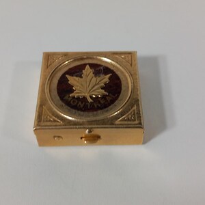 Collectable vintage shaped Metal pill box / trinket box / ornament