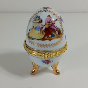 P## Collectable vintage French porcelain egg shaped pill box / trinket box / ornament