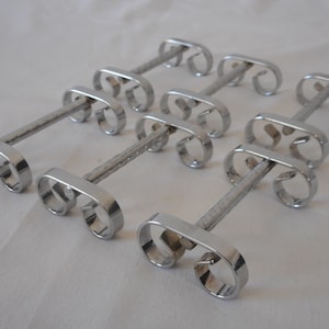 Set von 6 vintage französischen, silberfarbenen Metall / Messerbänken / Tischbesteck / Messerbänkchen aus Frankreich
