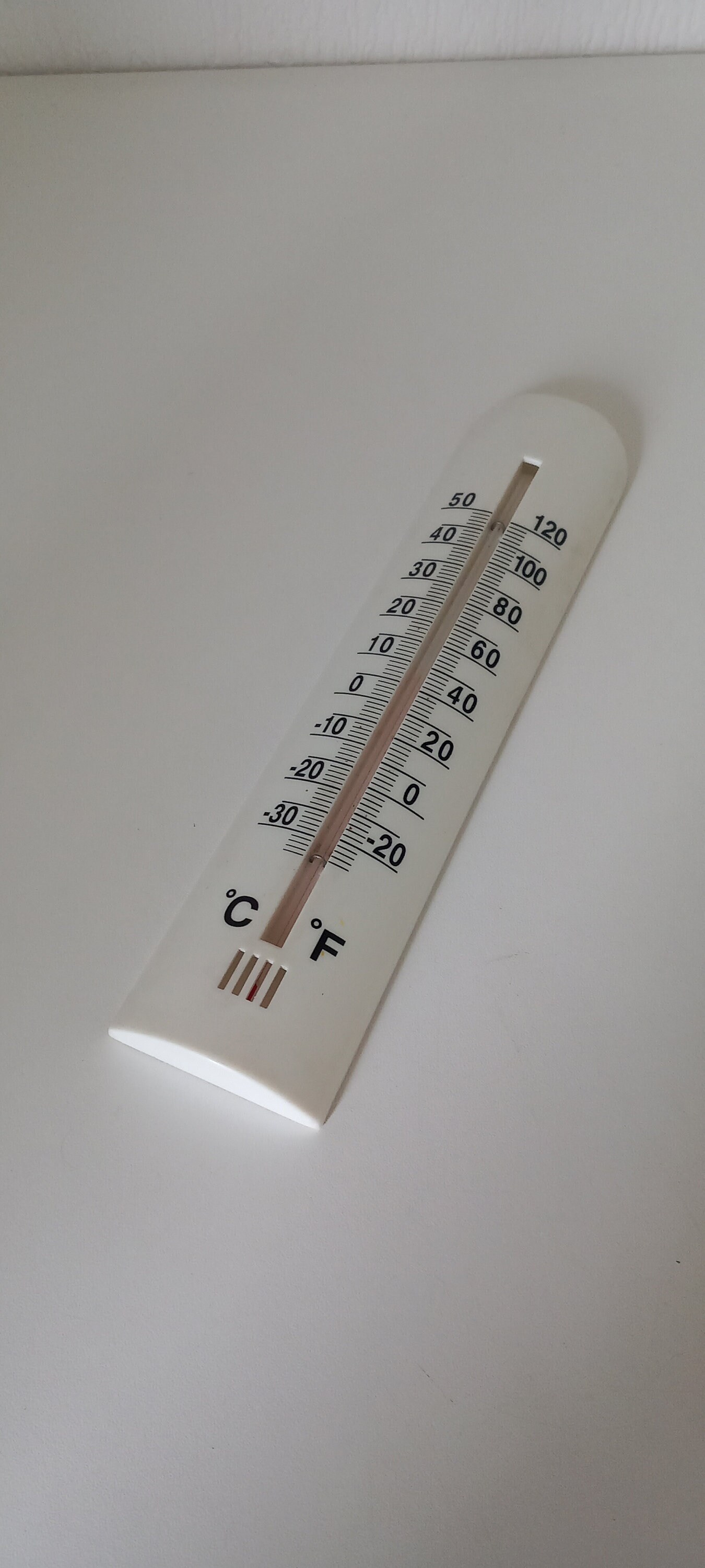 vintage French plastic wall mountable thermometer