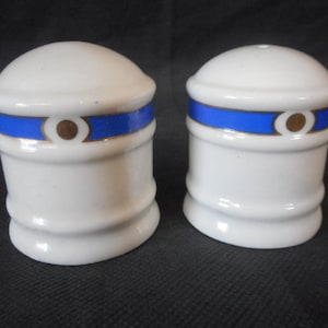 pair of vintage French Philippe Deshoulieres porcelain salt and pepper pots