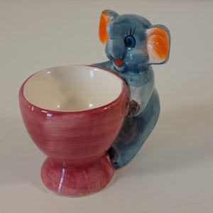 vintage French hand painted ceramic child,s egg cup/ holder