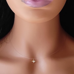 collier ras du cou femme fil nylon transparent petit pendentif étoile zircon acier inoxydable doré