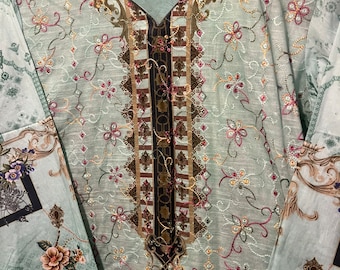 Sea green  color lawn embroidered dress with chiffon dupatta.