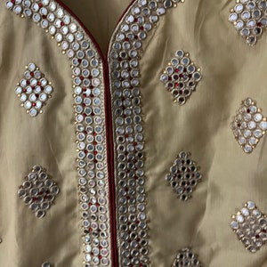 Golden and red mirror work Pakistan/Indian lehnga.