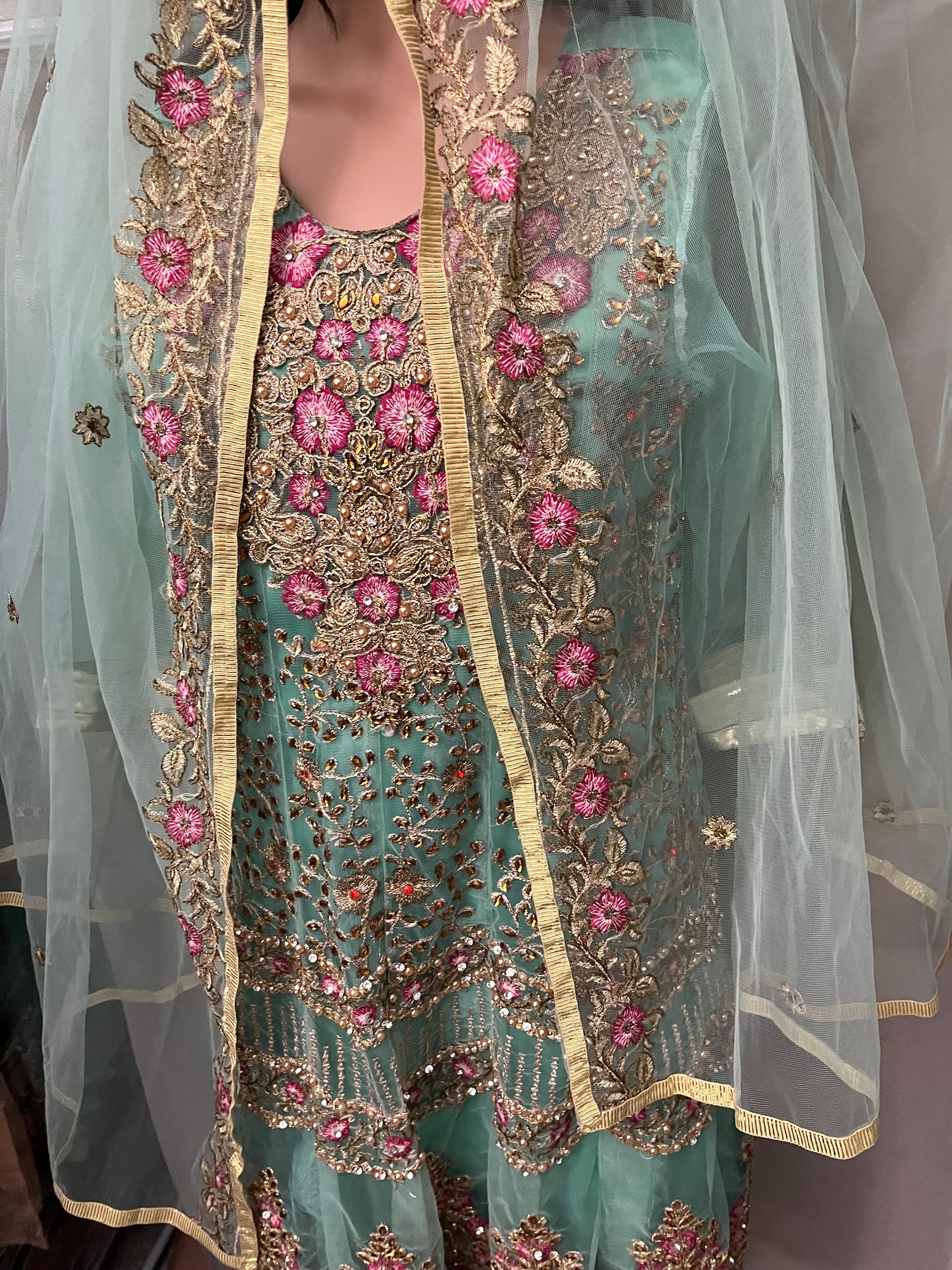 pakistani peplum dress with trousers Pink Peplum Top With Sharara Pants And Embroidered Belt