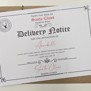 Delivery Notice From Santa including childs name and information about a larger gift that Santa couldn't leave under the tree eg; bike.
Includes brown envelope with childs name printed on