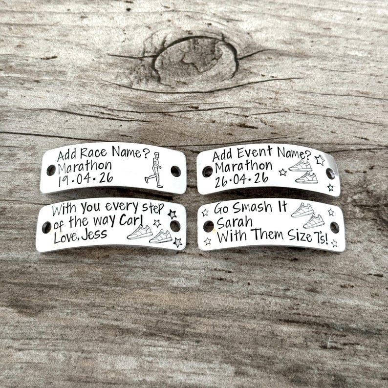 May include: Four rectangular silver-toned metal shoe tags with rounded edges and two holes for attachment. Each tag features engraved black text and graphics, including running shoes, stars, and a runner, with personalized messages and dates.