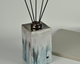 Handmade ceramic reed diffuser for connoisseurs of unique fragrances. One-of-a-kind stylish art diffusers for home decor.
