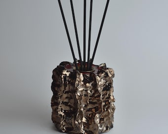 Handmade ceramic reed diffuser for connoisseurs of unique fragrances. One-of-a-kind stylish art diffusers for home decor.