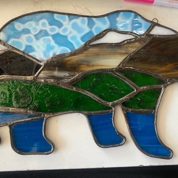 Stained Glass Bear with Nature Scene