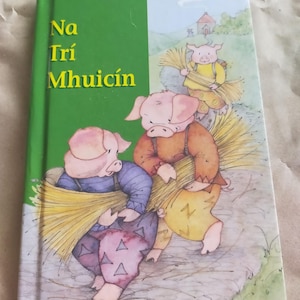 Na Tri Mhuicin, Los tres cerditos Sally Lambert Lengua irlandesa Libro infantil Dibujos animados educativos Gaélico gaélico