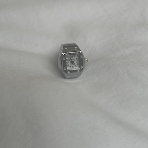 Working white square clock ring