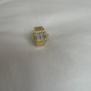 Working gold square clock ring