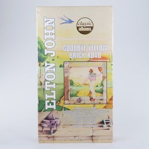 Kaseta VHS ELTONA JOHNA, "Goodbye Yellow Brick Road" (2001) zapieczętowana, stan idealny